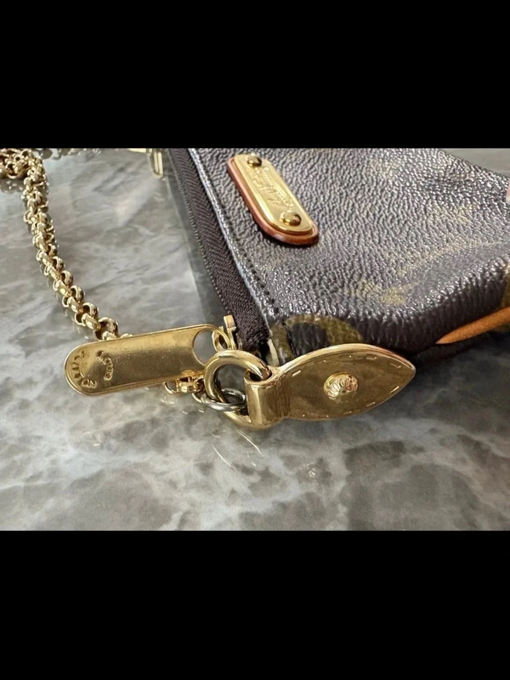 Louis Vuitton Monogram Canvas Mini Pochette - Brown